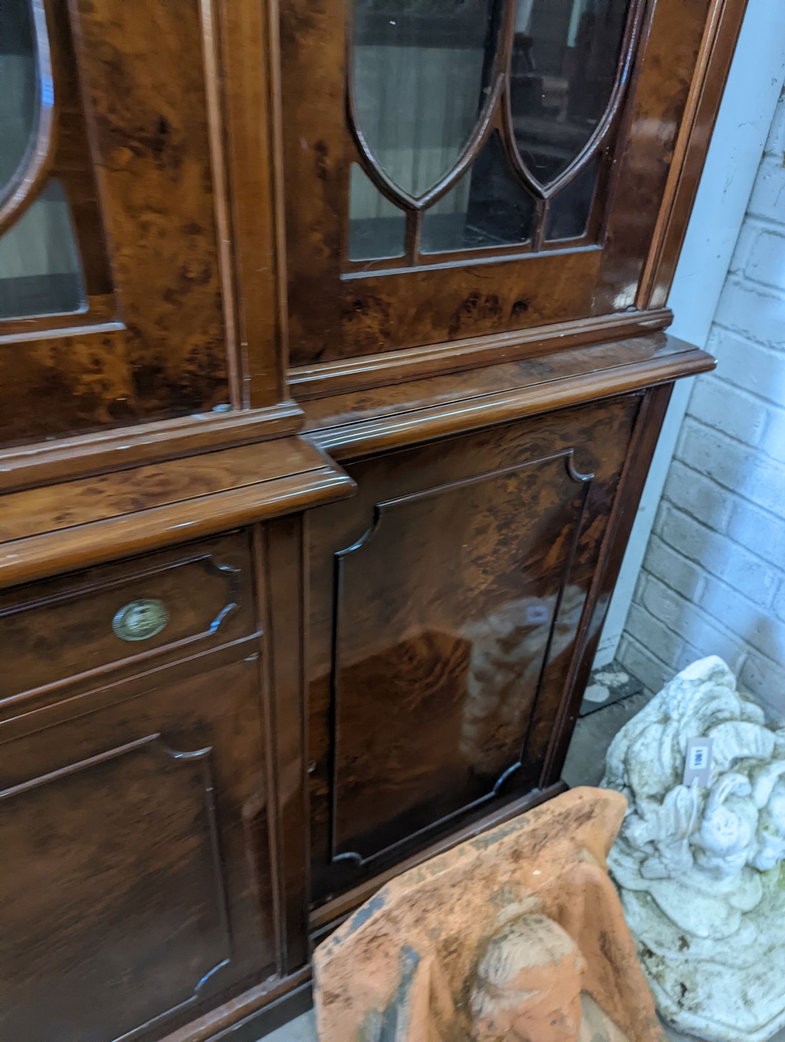 A Victorian style walnut breakfront library bookcase, length 168cm, depth 46cm, height 219cm